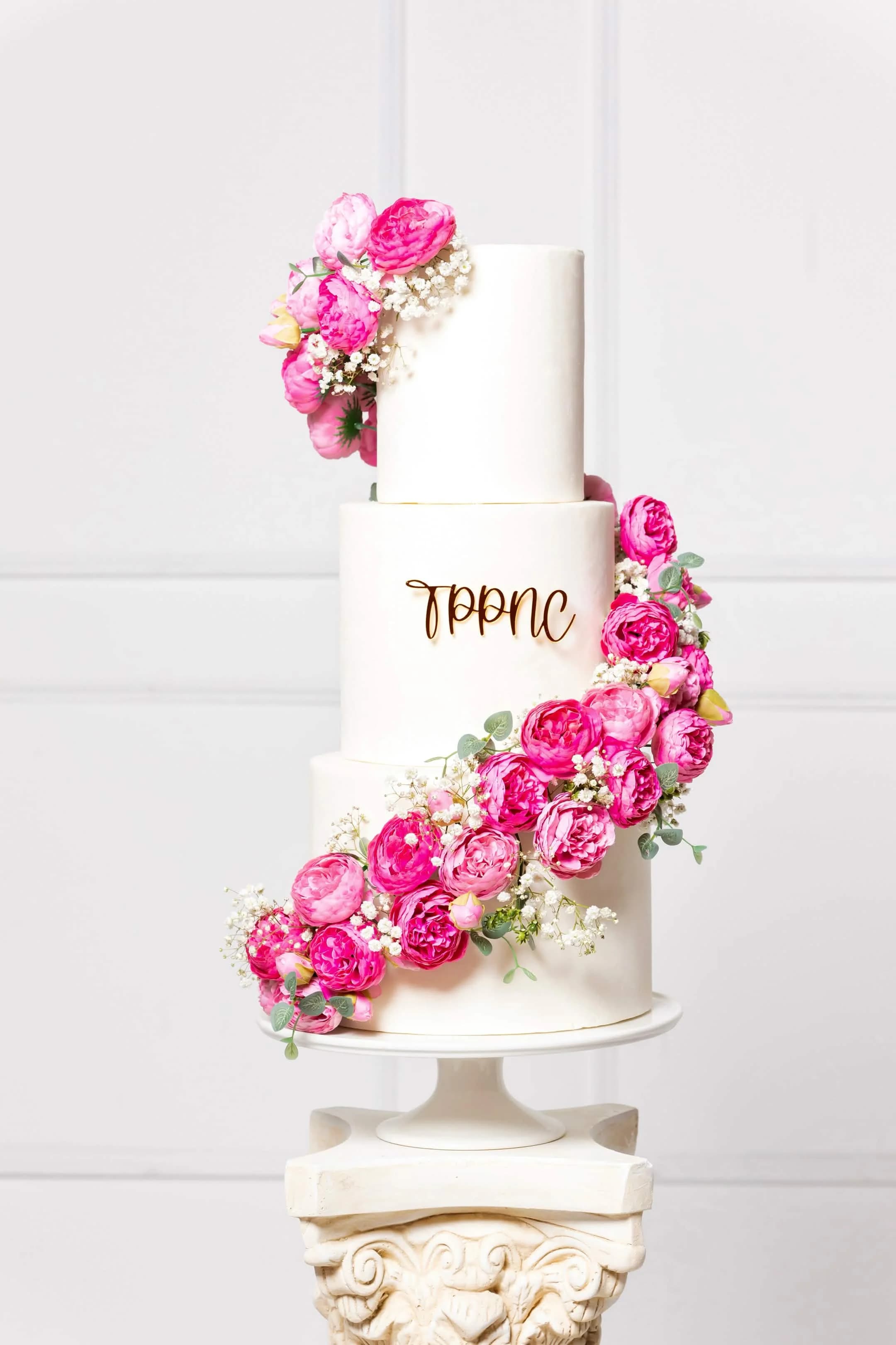 A decorated cake on a bakery table.