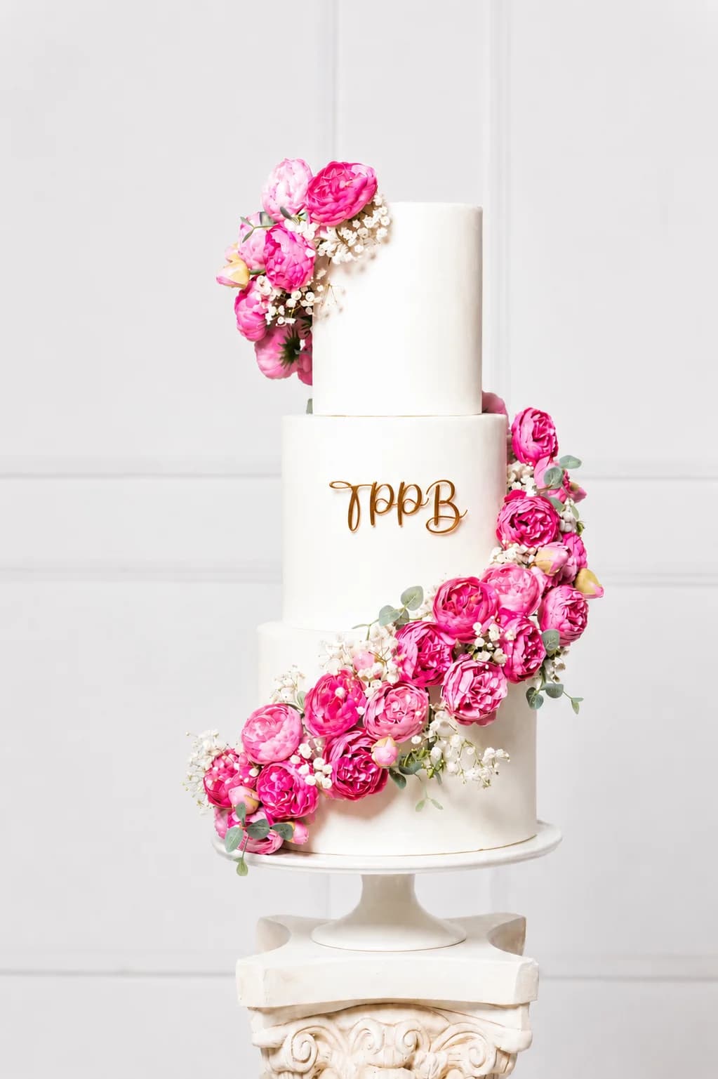 A decorated cake on a bakery table.